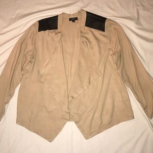 Tan blazer with black accents